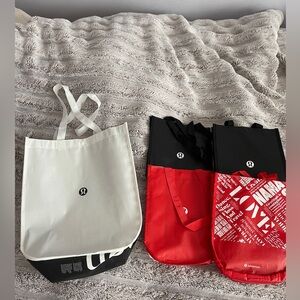 Bundle of lululemon athletica shopping bags